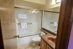 Primary bathroom with a shower/tub combo